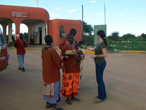 Robyn de Jager - buying curios from a few local market sellers